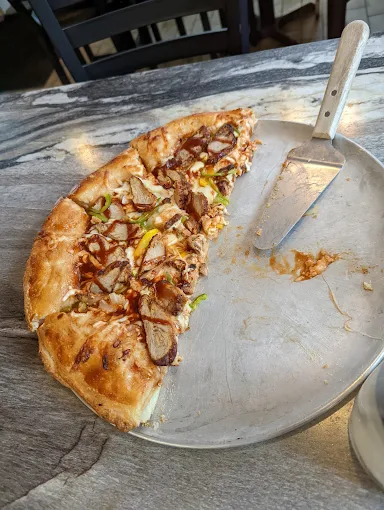Pizza maison du Resto les P'tits Délices